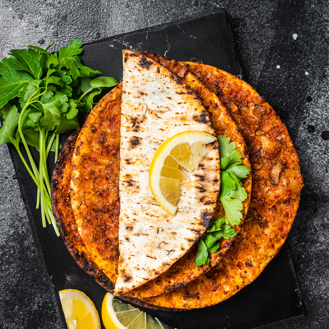2_0005_lahmacun_traditional_turkish_pizza_and_wraps_with_salad_on_marble